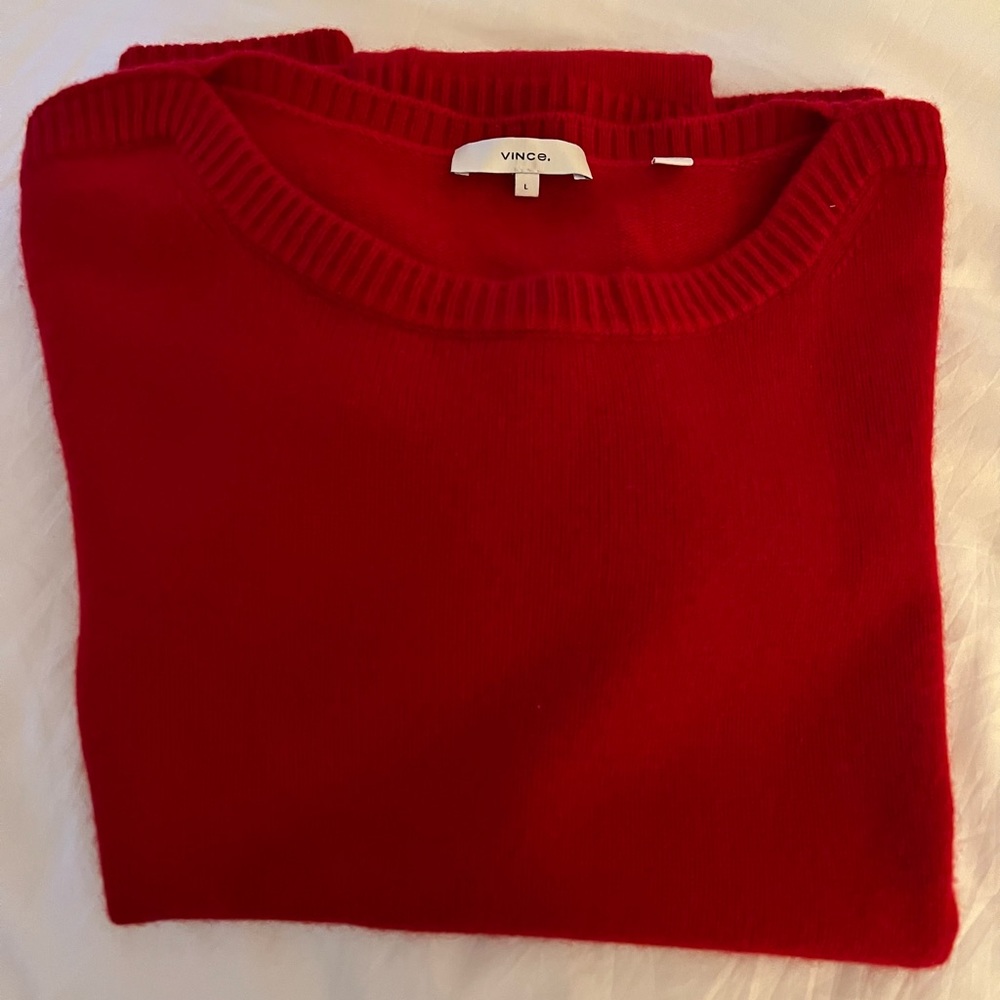 Beautiful red cashmere sweater by Vince. The perfect finish to any outfit.!